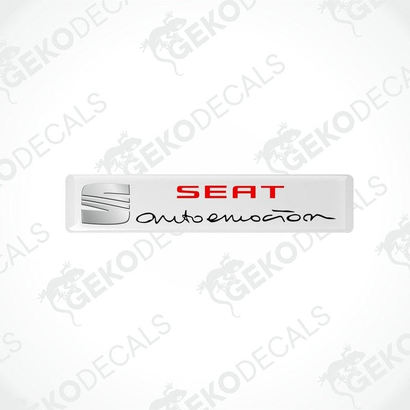 Withe vinyl decals with polyurethane coating featuring the SEAT AUTOEMOUTION logo in black lettering.