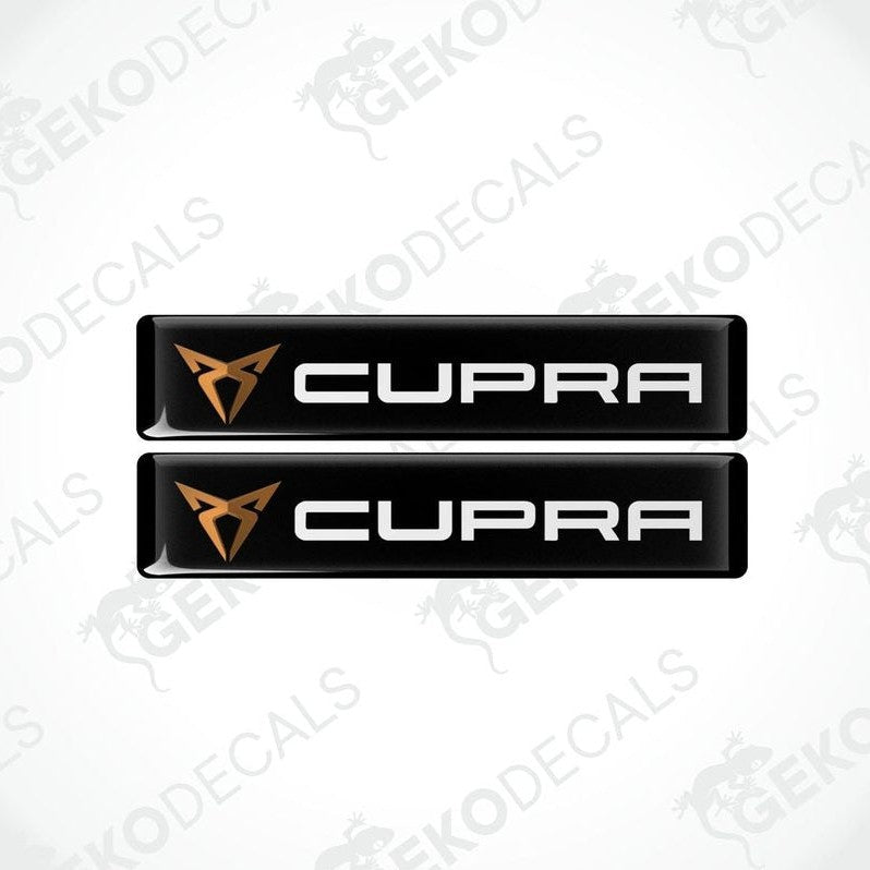 Two black vinyl decals with polyurethane coating featuring the SEAT CUPRA logo in white lettering.
