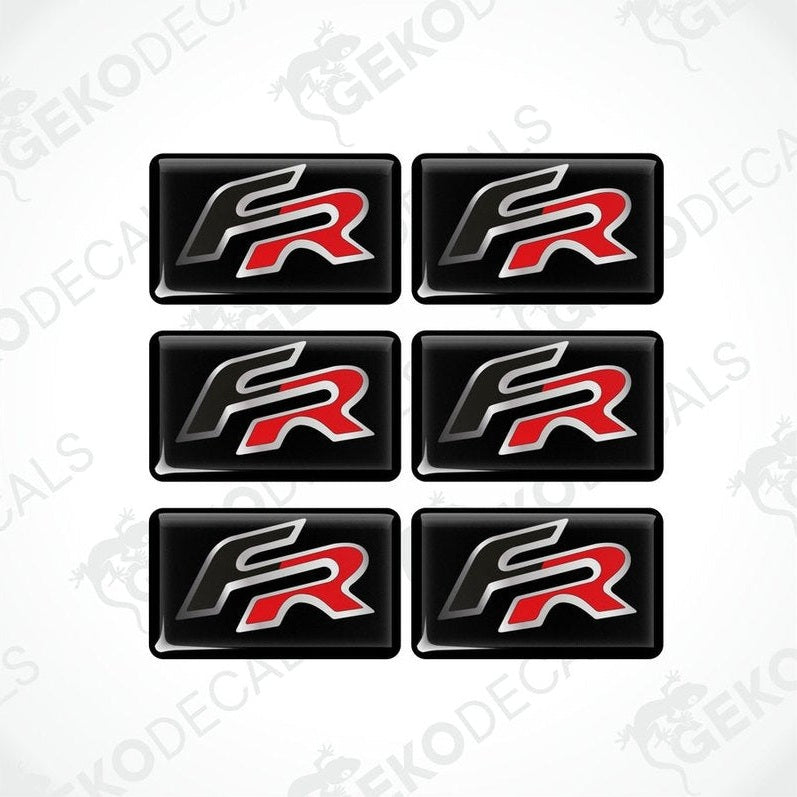 A set of six black vinyl stickers with a red 'R' logo, arranged in a row.
