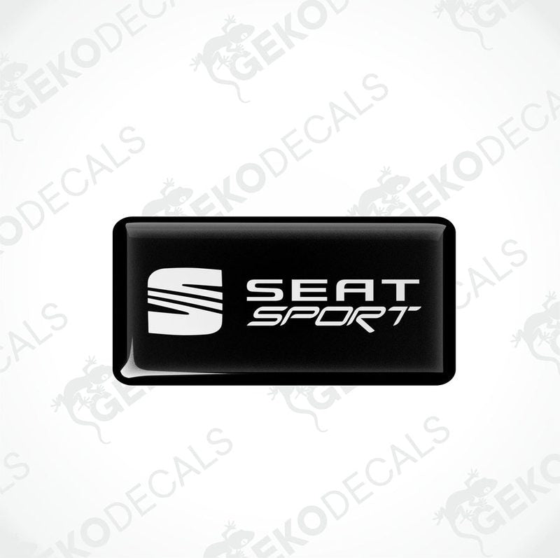 Black rectangular car decals with the white text 'SEAT SPORT' on them.