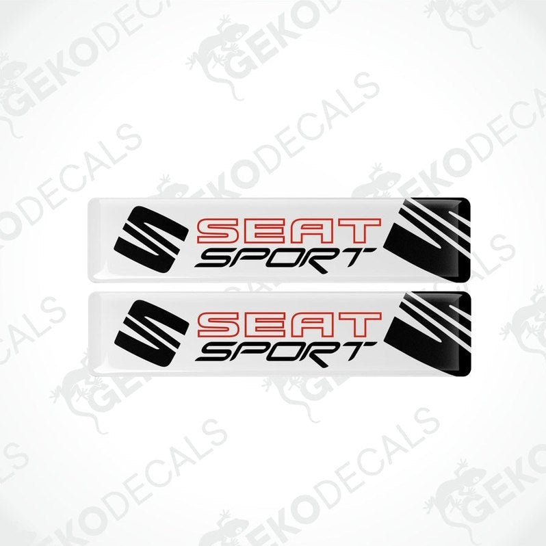 Two withe, black, and red vinyl stickers with the text 'SEAT SPORT' printed on them.