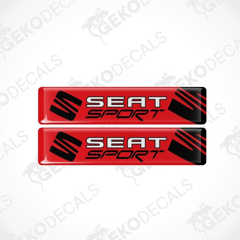Two red, black, and white vinyl stickers with the text 'SEAT RACING' printed on them.