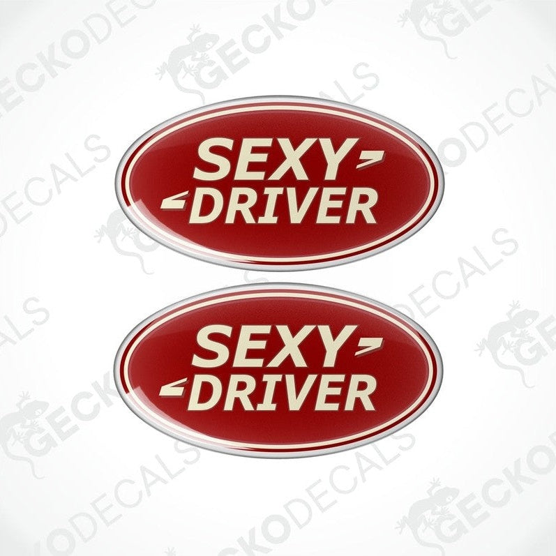 Two red oval-shaped vinyl decals with the text 'SEXY DRIVER' in white letters.