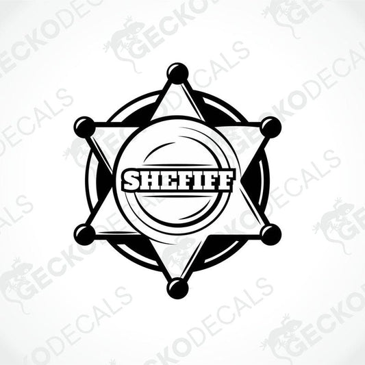 A black and white die cut sticker with the word 'SHEFIFF' in the center, designed to resemble a sheriff's badge.