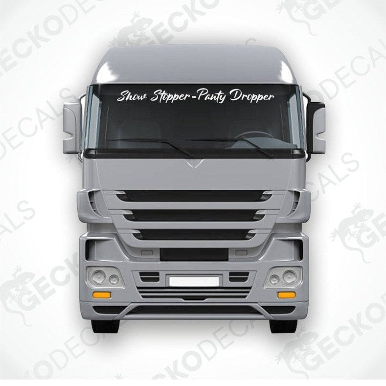 A decal with the text 'Show Stopper Panty Dropper' displayed on the front of a gray truck.