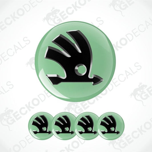 Set of green and black Skoda logo decal on a white background