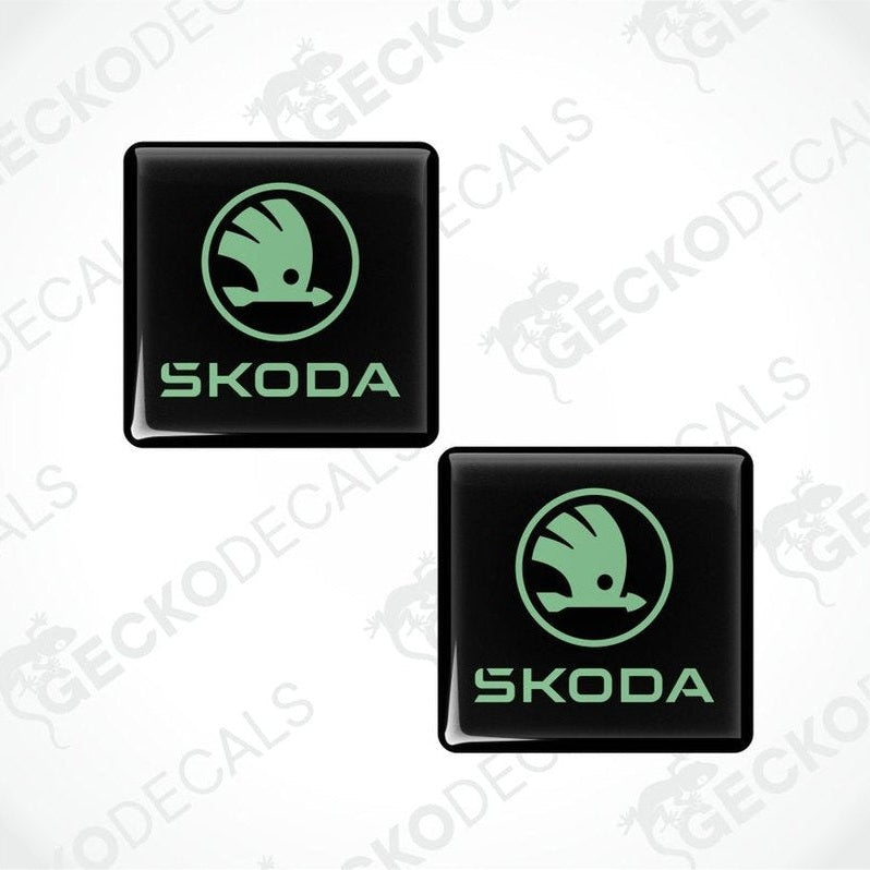 Two Skoda logo stickers on a white background with 'Gecko Decals' branding.
