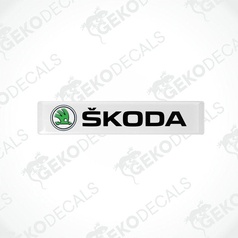  Withe decals with the Skoda logo and the text 'SKODA AUTO' in black.