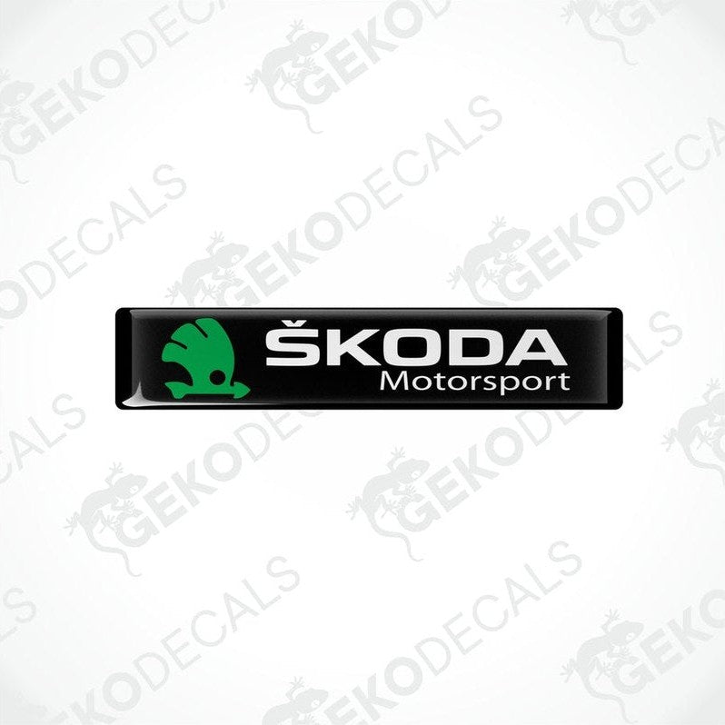 Black, green, and white decals with the Skoda Motorsport logo.