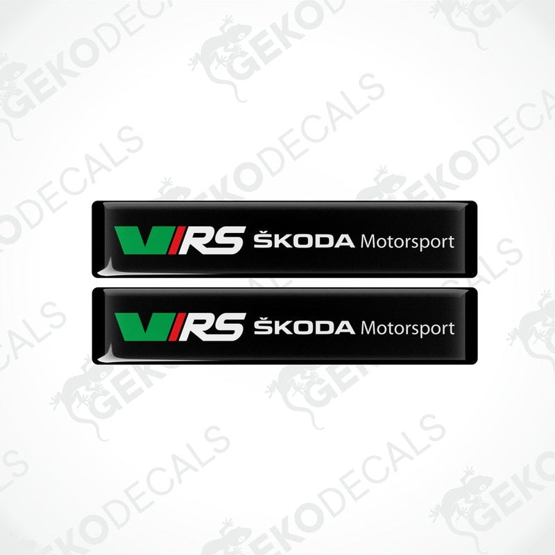 Two black rectangular decals with the logo 'VRS Škoda Motorsport' in white and green.