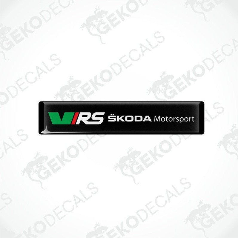 Black rectangular decals with the logo 'VRS Škoda Motorsport' in white and green.