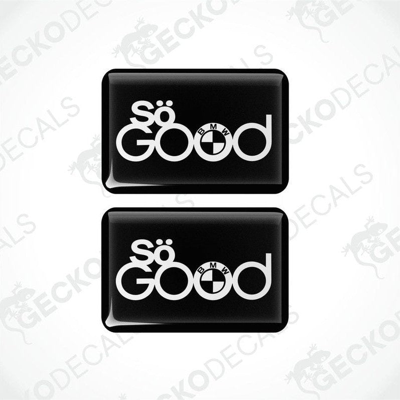 Two black rectangular car decals with white text 'So Good' and the BMW logo.