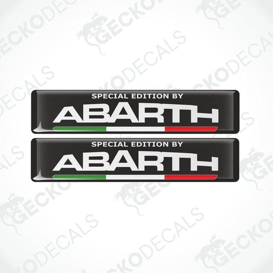 Two vinyl decals with polyurethane coating featuring the text 'SPECIAL EDITION BY Abarth' on a black background with the Abarth logo and the Italian flag colors.