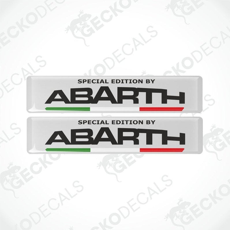 Two vinyl decals with polyurethane coating featuring the text 'SPECIAL EDITION BY Abarth' on a white background with the Abarth logo and the Italian flag colors.