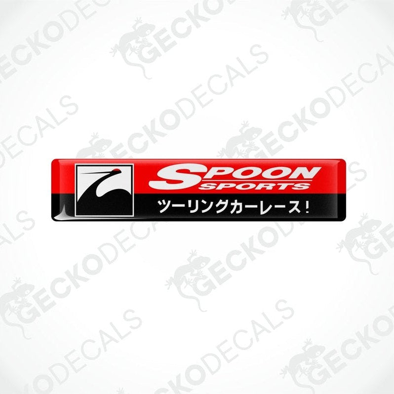 Red, black, and white vinyl decals with the Spoon Sports logo and text