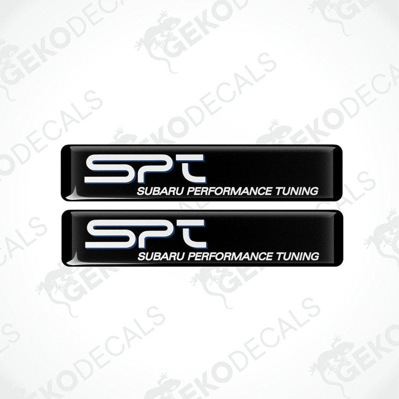 Two black vinyl stickers with 'SPT' and 'SUBARU PERFORMANCE TUNING' text in white and blue.