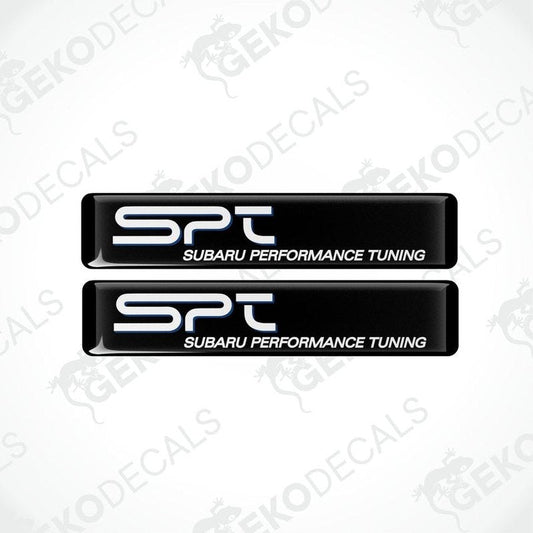 Two black vinyl stickers with 'SPT' and 'SUBARU PERFORMANCE TUNING' text in white and blue.