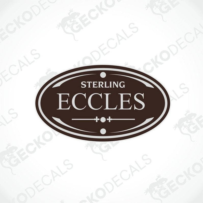 A printed decal with the word 'Eccles' and a branding logo, predominantly in brown and white colors with a decorative element on the border.