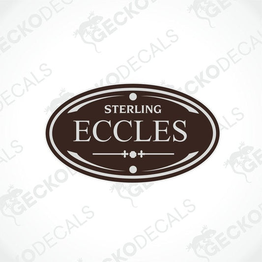 A printed decal with the word 'Eccles' and a branding logo, predominantly in brown and white colors with a decorative element on the border.