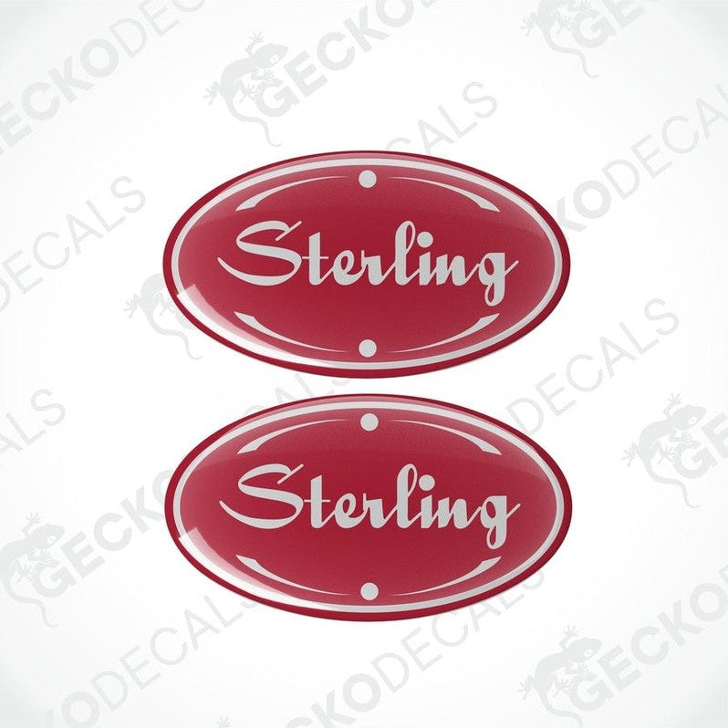 Two red, white, and black vinyl stickers with the word 'STERLING' printed on them.