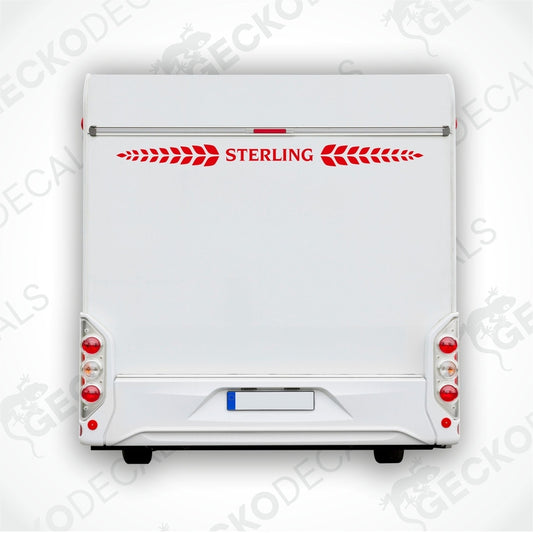 A white Sterling caravan with a red and white decal on the rear side, featuring the brand name 'STERLING'.