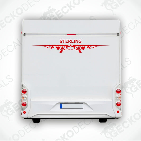Rear decal of a white caravan with the brand name 'STERLING' in red and black.