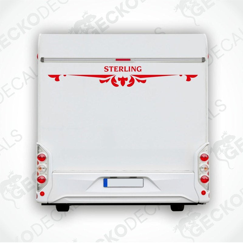 A white caravan with a red and black 'STERLING' decal on the rear side.