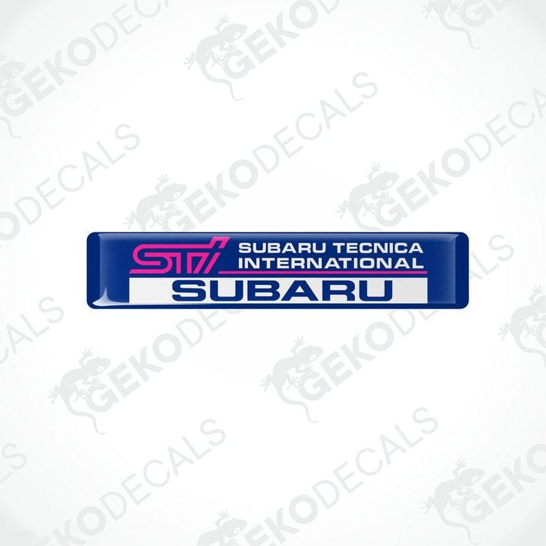 Blue vinyl stickers with 'SUBARU TECNICA INTERNATIONAL STI ' text, featuring a pink and withe color scheme.