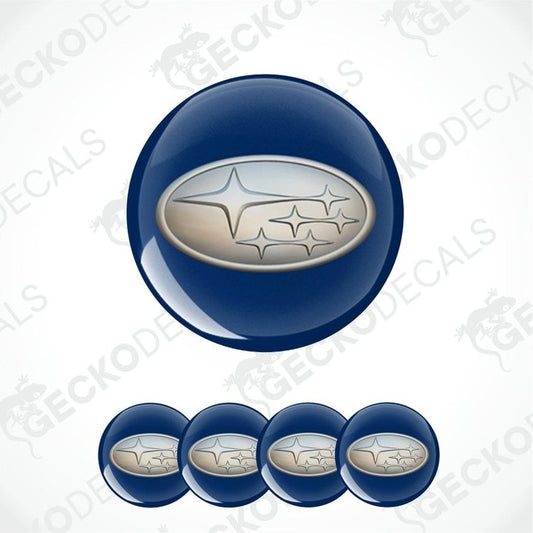 Set of Subaru logos on blue round stickers with a white background.