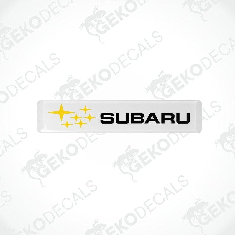 Withe vinyl stickers with the Subaru brand logo and star graphics.