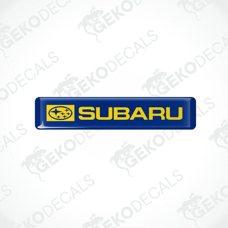 Blue decals with the Subaru car logo and the word 'SUBARU' in yellow letters.