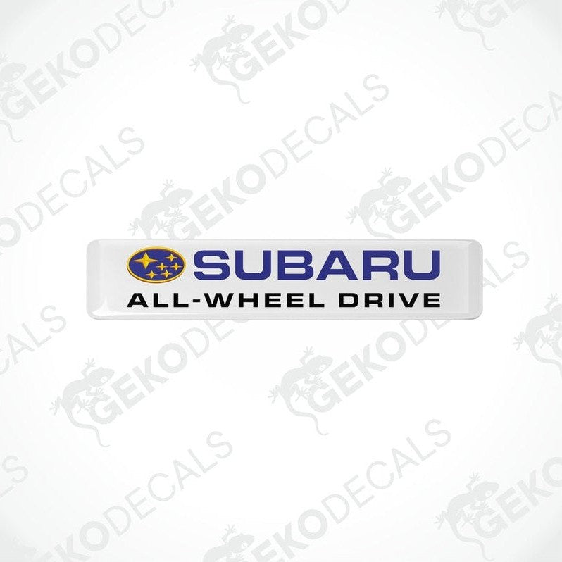  White vinyl stickers with the Subaru brand logo and the slogan 'ALL-WHEEL DRIVE' printed in blue and yellow.