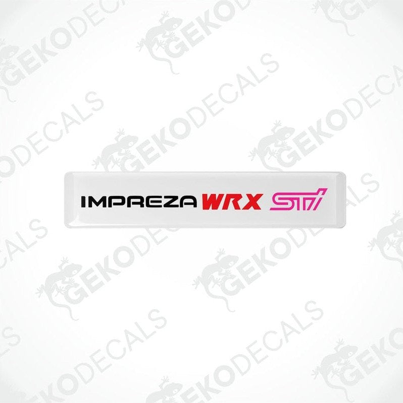  White vinyl stickers with the text 'IMPREZA WRX STI' in red and pink. The stickers are designed to be applied on a vehicle.