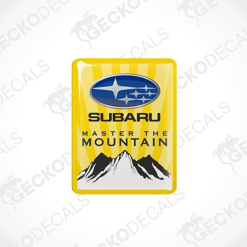  Yellow vinyl stickers with the SUBARU brand logo and the text 'MASTER THE MOUNTAIN' along with a mountain range illustration.