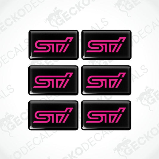A set of six black vinyl stickers with the word 'STI' in pink lettering.