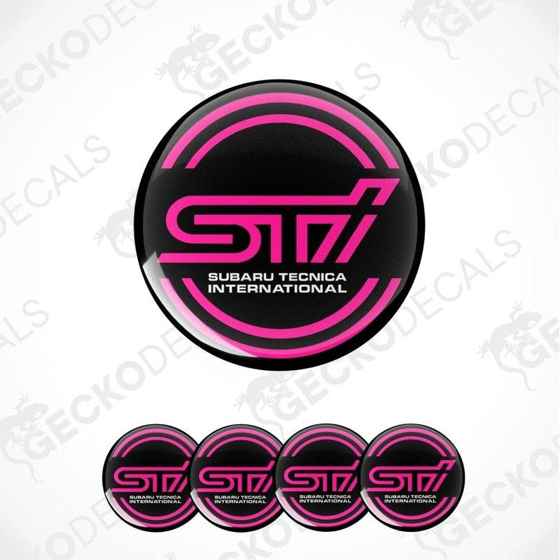 Set of Subaru Tecnica International (STI) decals with pink and black design on a white background.