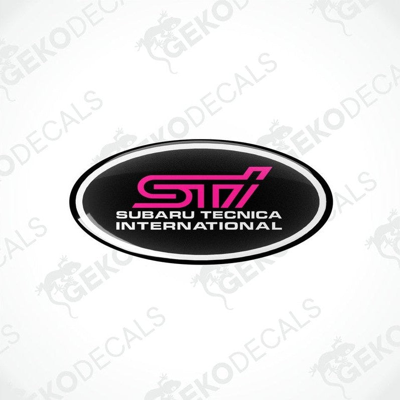  Oval-shaped decals with 'STI SUBARU TECNICA INTERNATIONAL' text in pink on a black background.