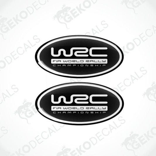 Two oval-shaped black and white vinyl decals with the WRC (World Rally Championship) logo.