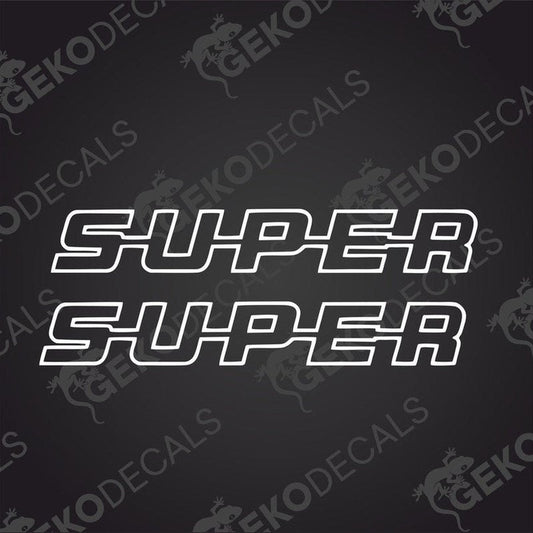 A black die cut sticker with the word 'SUPER' in white capital letters, delivered on a transfer paper with the Gecko Decals logo.