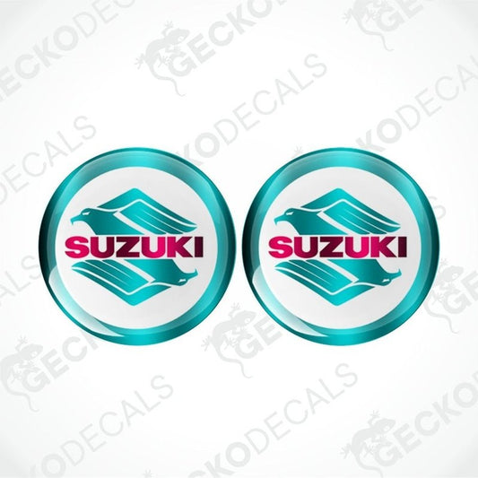 Two Suzuki logos on a white background with 'Gecko Decals' branding.