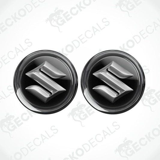 Two black and silver Suzuki logos on a white background with 'Gecko Decals' branding.