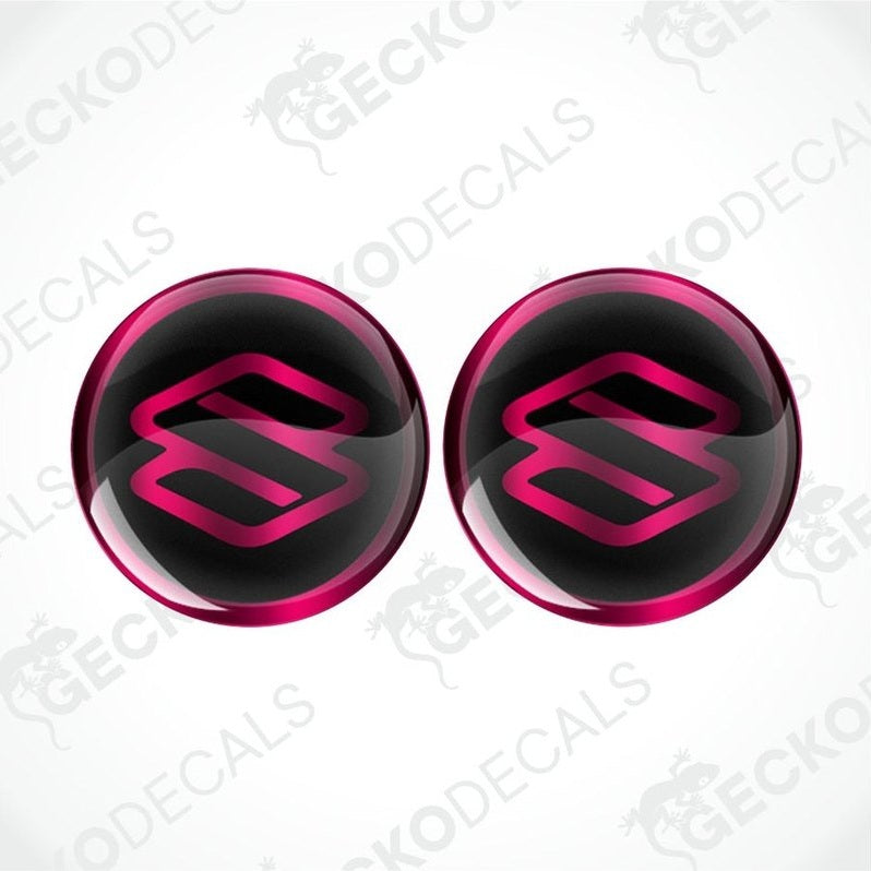 Two glossy black and pink circular emblems with a logo on a white background with 'Gecko Decals' branding.