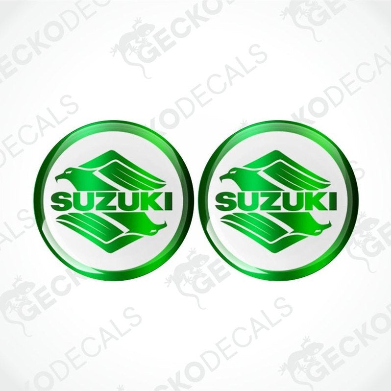 Two green Suzuki logos on a white background with 'Gecko Decals' branding.