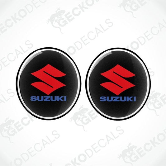 Two Suzuki logos on a white background with 'Gecko Decals' branding.