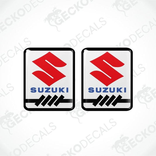 Two Suzuki logos with a red and black design on a white background.