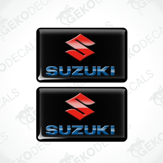 Two black vinyl stickers with the SUZUKI logo in blue and red.