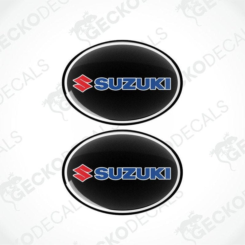 Two Suzuki logos on a white background with 'Gecko Decals' branding.