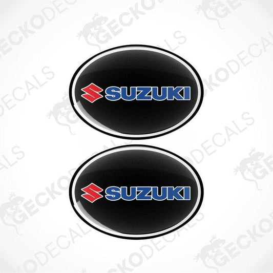 Two Suzuki logos on a white background with 'Gecko Decals' branding.