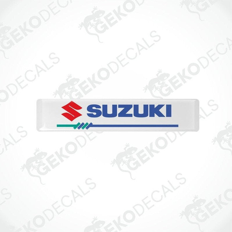 White vinyl stickers with the SUZUKI brand logo in blue and red.
