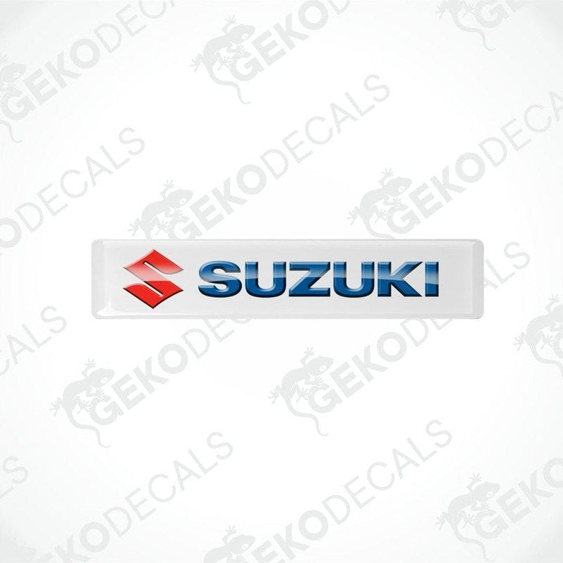 White vinyl stickers with the SUZUKI brand logo in blue and red.